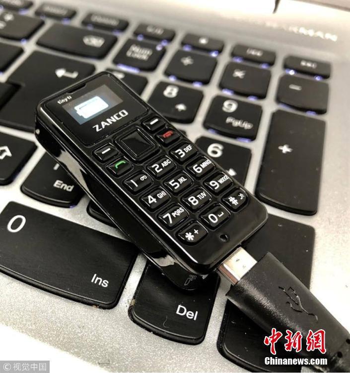 世界最袖珍手機只比硬幣稍大 鍵盤屏幕五臟俱全