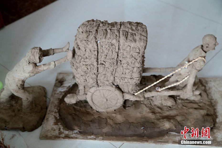 “泥塑達(dá)人”用泥巴還原農(nóng)耕生活載鄉(xiāng)愁